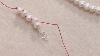 How To Knot Pearls On A String [upl. by Einneg]